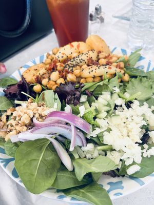 This was my mom’s salad, had delicious peaches in it. Im not sure if that was cheese on here or rice, but you can leave it off   at Zambra Fusion Cafe in Corpus Christi