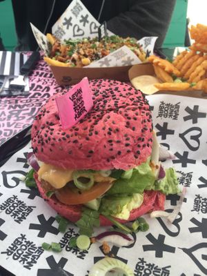 pink vegan “Daddy burger" at Vegan Junk Food Bar  - Rotterdam in Rotterdam
