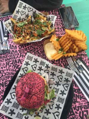 vegan ribs, grid potato fries with mayonnaise and a pink burger 🍔  at Vegan Junk Food Bar  - Rotterdam in Rotterdam