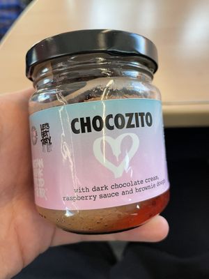 Chocozito - a Dessert with dark chocolate cream, faspberry sauce and brownie dough, here as to go option  at Vegan Junk Food Bar  - Rotterdam in Rotterdam