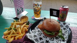 Fish burger and beer at Vegan Junk Food Bar  - Rotterdam in Rotterdam