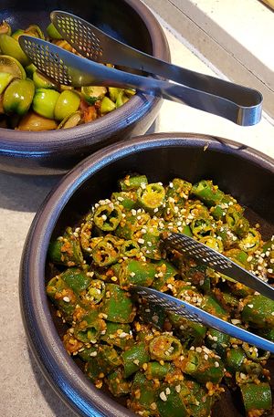  Green peppers in fermented bean paste (doenjang 된장) and pickled tomatoes are vegan. at HanCook - 한쿡 in Seoul