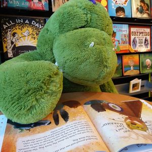 The Firestorm kid space has a new resident. After traveling 66 million years to reach the co-op, Ursula K. Le Rex has a lot of reading to catch up on! We sat down with some new books, including "A Day in the Life of Marlon Bundo." at Firestorm Books & Coffee in Asheville