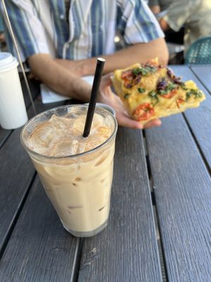Iced chai vanilla latte and vegan focaccia bread   at Dose Coffee in Revelstoke