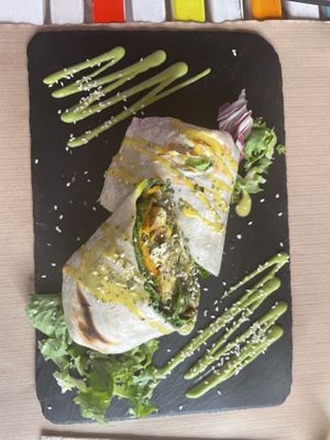 beyond meat, sauteed vegetables and tofu wrap  at Sanissimo - Gran Via in Madrid
