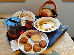 Babaganoush, Neni's Hummus Original and Haya's Famous Popcorn Falafel at NENI in Cologne