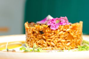 Arroz Mimo

Creamy rice with porcini, red onion, and leek, finished with saffron cream and oyster mushroom. at MIMO in Malaga