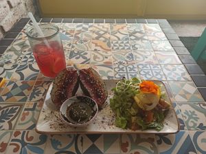 Onigirazu sandwich filled with seasonal veggies and the best marinated tempeh I've ever had. at MIMO in Malaga