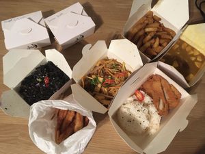 Stir-fried kale + chilli, sweet potato fries, Singapore noodles, salt + chilli chips and king trumpet katsu curry! at Suissi Vegan Kitchen  in Glasgow