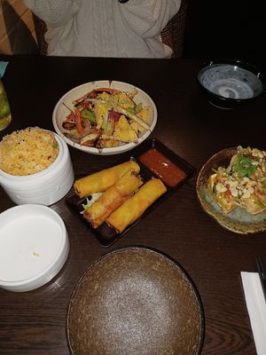Spring rolls, tofu pockets, fried rainbow rice, and salt and chilli tofu at Suissi Vegan Kitchen  in Glasgow