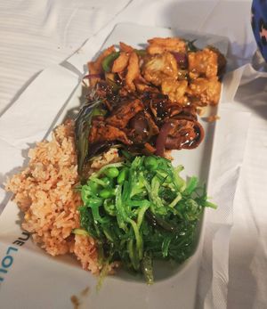 Black bean tofu, fried rainbow rice, seaweed + edamame, satay tofu and salt + chilli chips at Suissi Vegan Kitchen  in Glasgow