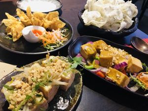 Wontons, vegan crackers, satay tofu and tofu parcels  at Suissi Vegan Kitchen  in Glasgow