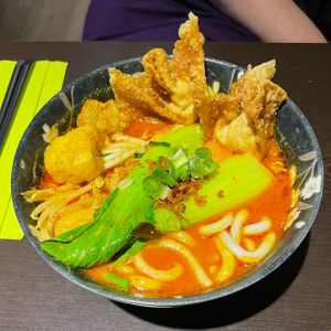 Laksa curry with udon noodles at Suissi Vegan Kitchen  in Glasgow