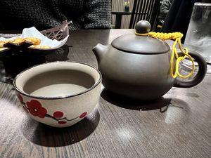 Lemongrass tea in a tiny pot   at Suissi Vegan Kitchen  in Glasgow