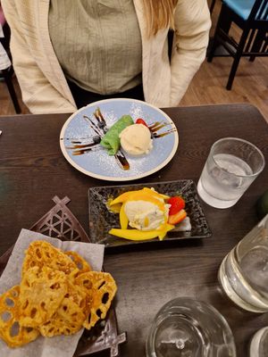 From top to bottom: Coconut pancake with vanilla ice cream; Mango and passionfruit ice cream. at Suissi Vegan Kitchen  in Glasgow