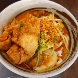 Laksa with udon noodles at Suissi Vegan Kitchen  in Glasgow