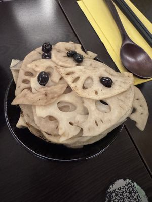 Lotus root and pickled black bean   at Suissi Vegan Kitchen  in Glasgow