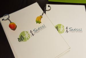Cute menus at Suissi Vegan Kitchen  in Glasgow