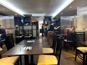 [The table had people coming and going, even under Covid19, Vegan Power is still very strong.] at Suissi Vegan Kitchen  in Glasgow