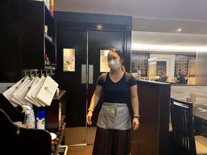 [Another of the Manager with a Master in Marketing. No Covid here just great food and friendly people.]  at Suissi Vegan Kitchen  in Glasgow