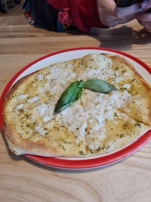 Vegan garlic pizza bread, cheese was nice and melted well at Frankie & Benny's - Fort Shopping in Glasgow