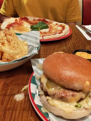 Vegan pizza, vegan cheesy chilli chips and vegan burger  at Frankie & Benny's in Renfrew