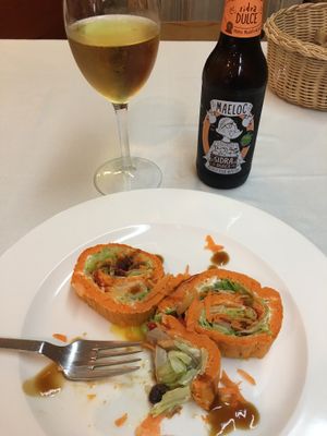 Pionono roll appetizer. at Curcuma in Vigo