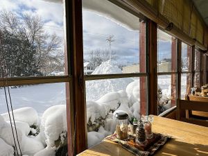 We are open, and we made a snow pile for you to play on. at Spring Green General Store in Spring Green