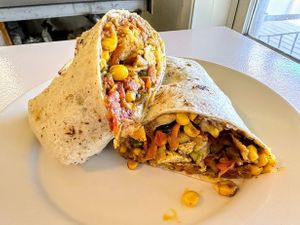 Best vegan breakfast entree- tofu chiliquile burrito served weekends 8 am until noon. at Spring Green General Store in Spring Green