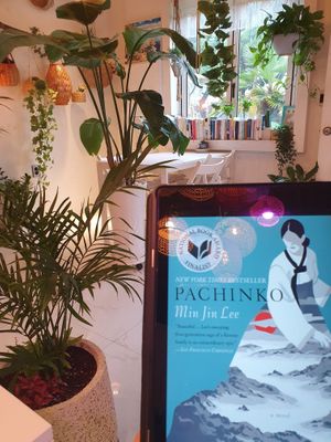 The inside has many plants and a calm vibe! at Palm Tree in Busan