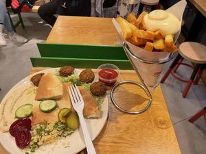 Hummus plate and fries  at Maoz in The Hague
