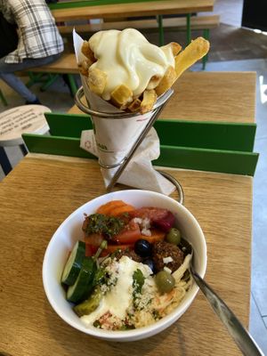 Small fries with mayo and salad bowl with falafel: both good  at Maoz in The Hague