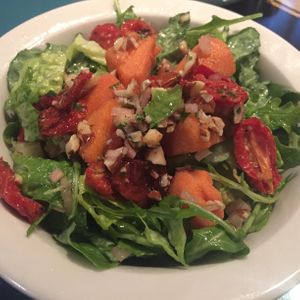 Salad with truffle vinaigrette  at Natural Oasis Cafe in Rochester