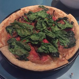 Pizza with mushrooms, garlic, spinach  at Natural Oasis Cafe in Rochester