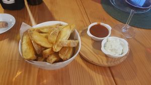 Potato wedges with sauces at A Porta Verde in Santiago De Compostela