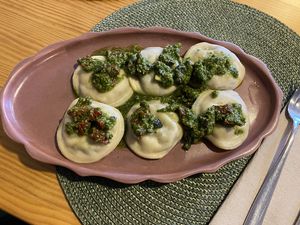 Pumpkin Ravioli with pesto and sundried tomato. Yum!  at A Porta Verde in Santiago De Compostela