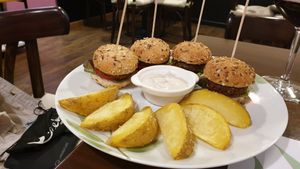 Vegan burgers and wedges at A Porta Verde in Santiago De Compostela