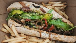 Mushroom Cheezesteak, + arugula/avocado at So Radish in Arvada