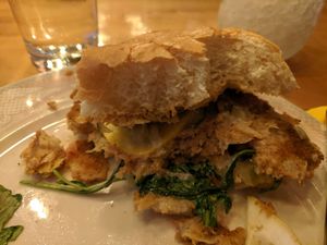 Hearty "Crab" Sandwich.
“Crab” patty made with hearts of palm and artichoke heart,  served vegan tartar sauce, pickled zucchini & yellow squash, tomato, arugula, lemon, vegan b at So Radish in Arvada