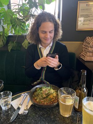 A photo of my friend taking a photo of his main (his photo to follow)   at Café du Temps in Aix-en-provence