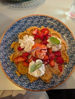 Vegan waffles with strawberries and cream at Älskade Traditioner in Stockholm