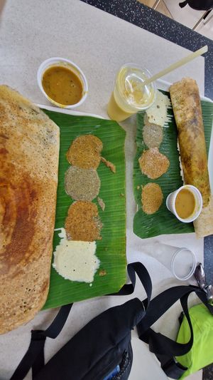 Dari with four dips and a lassi at Murugan Idli Shop in Central Singapore