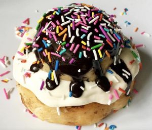 Cake Batter Frosting with Cookie Dough, Chocolate Sauce & Rainbow Sprinkles! at Cinnaholic in Pearland