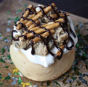 Vanilla Frosting, Cookie Dough, Pretzels & Chocolate Sauce! at Cinnaholic in Pearland