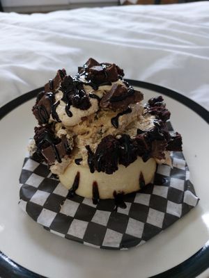 Toppings are Brownie, PB-Cubs and Chocolate sauce at Cinnaholic - 82nd Ave in Edmonton