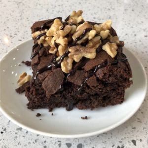 Brownie with Nuts & Chocolate Sauce! at Cinnaholic - 82nd Ave in Edmonton