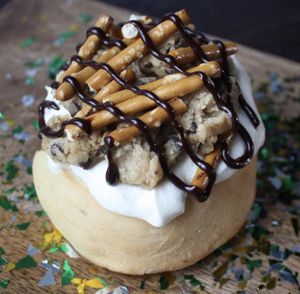 Vanilla Frosting, Cookie Dough, Pretzels & Chocolate Sauce! at Cinnaholic - 82nd Ave in Edmonton