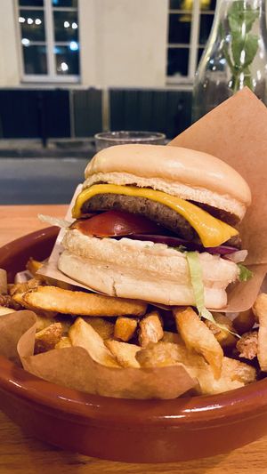 Cheeseburger with fries   at Mōpa in Paris