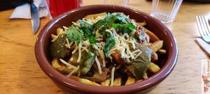 My poutine (replace mushroom with peppers) at Mōpa in Paris