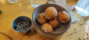 Mini churros with chocolate pepites at Mōpa in Paris